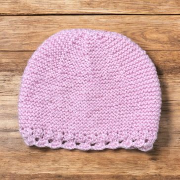 Rózsaszín kötött sapka